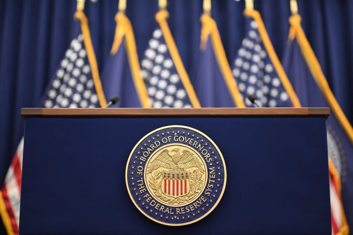 markets dip ahead of the federal reserve's decision as investors await key economic signals and potential policy changes affecting global financial stability.