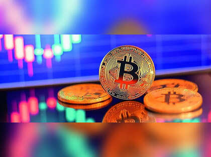 bitcoin prices fall while gold remains stable amid rising concerns over a trade war.